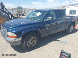 2002 Dodge Dakota SLT with VIN 1B7HL48N32S708719, listed as a IAAI auction lot 42027763 with 217,797 mi miles. Bid and sale history available at carsss.com. Image 2.