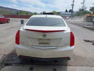 2014 Cadillac ATS Luxury RWD z VIN 1G6AB5RX6E0130600, wystawiony jako IAAI lot #42094510 z przebiegiem 122 872 mil mil oraz . Historia ofert i sprzedaży dostępna na DreamBid. Obrazek 16.