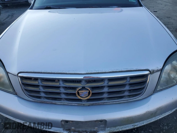 2002 Cadillac DeVille DHS z VIN 1G6KE57Y02U304933, wystawiony jako Copart lot #86919134 z przebiegiem Nie podano mil oraz Czysty tytuł • Clean title. Historia ofert i sprzedaży dostępna na DreamBid. Obrazek 11.