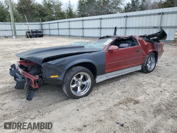 1987 Chevrolet Camaro z VIN 1G1FP21H2HN131699, wystawiony jako Copart lot #87860445 z przebiegiem 86 117 mil mil oraz Szkoda całkowita • Salvage title. Historia ofert i sprzedaży dostępna na DreamBid. Obrazek 1.