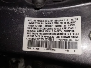 2020 Honda Civic LX z VIN 19XFC2F65LE030888, wystawiony jako IAAI lot #41609630 z przebiegiem 115 614 mil mil oraz . Historia ofert i sprzedaży dostępna na DreamBid. Obrazek 9.