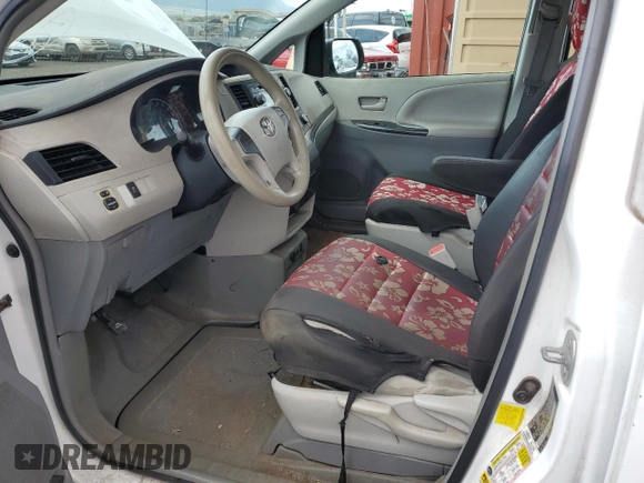 2012 Toyota Sienna with VIN 5TDZK3DC2CS272641, listed as a Copart auction lot 53378905 with 115,153 mi miles and Salvage title. Bid and sale history available at DreamBid. Image 7.
