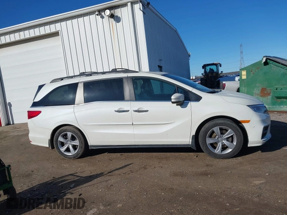 2018 Honda Odyssey EX-L with VIN 5FNRL6H75JB044422, listed as a IAAI auction lot 41730576 with 120,587 mi miles and . Bid and sale history available at DreamBid. Image 13.
