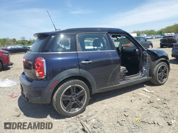 2015 MINI Countryman S with VIN WMWZC3C52FWT05882, listed as a Copart auction lot 54399525 with 125,971 mi miles and Salvage title. Bid and sale history available at DreamBid. Image 3.