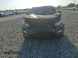 2015 Land Rover Range Rover Evoque Prestige z VIN SALVV2BG2FH012781, wystawiony jako Copart lot #57328405 z przebiegiem Nie podano mil oraz Szkoda całkowita • Salvage title. Historia ofert i sprzedaży dostępna na DreamBid. Obrazek 13.