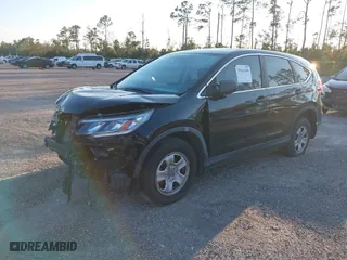 2015 Honda CR-V LX with VIN 2HKRM3H38FH512323, listed as a IAAI auction lot 39161499 with 133,787 mi miles. Bid and sale history available at carsss.com. Image 18.