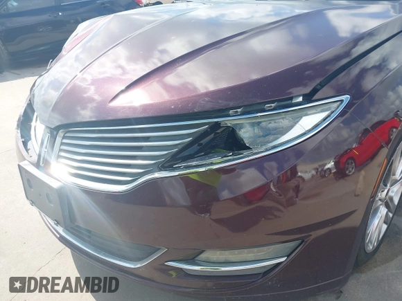 2013 Lincoln MKZ z VIN 3LN6L2GK2DR808761, wystawiony jako IAAI lot #42562086 z przebiegiem 124 087 mil mil oraz . Historia ofert i sprzedaży dostępna na DreamBid. Obrazek 18.