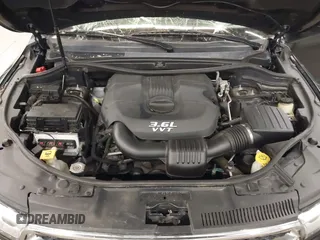 2013 Dodge Durango SXT with VIN 1C4RDJAG0DC512293, listed as a IAAI auction lot 41875919 with 191,128 mi miles and . Bid and sale history available at DreamBid. Image 10.