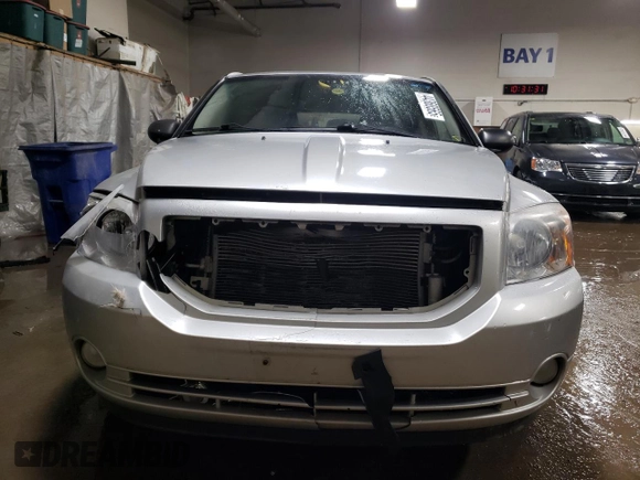 2011 Dodge Caliber Heat with VIN 1B3CB5HA9BD160912, listed as a Copart auction lot 44368565 with 210,028 mi miles and Salvage Title. Bid and sale history available at DreamBid. Image 5.
