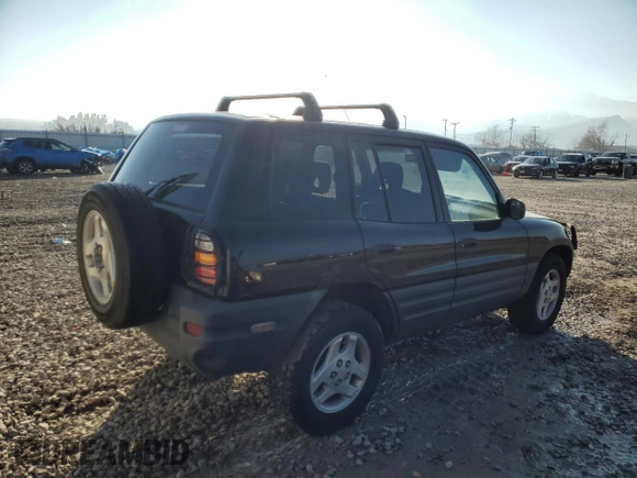 1998 Toyota RAV4 with VIN JT3HP10V6W0183708, listed as a Copart auction lot 87532705 with 273,397 mi miles and Clean title. Bid and sale history available at DreamBid. Image 3.