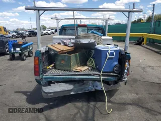 1997 Nissan Frontier XE with VIN 1N6SD11SXVC332100, listed as a Copart auction lot 54330245 with 203,959 mi miles and Salvage title. Bid and sale history available at DreamBid. Image 6.