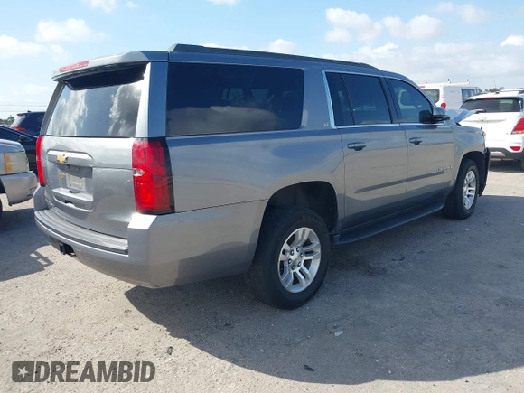 2020 Chevrolet Suburban LT z VIN 1GNSCHKC8LR157188, wystawiony jako IAAI lot #41578614 z przebiegiem 82 566 mil mil oraz . Historia ofert i sprzedaży dostępna na DreamBid. Obrazek 4.