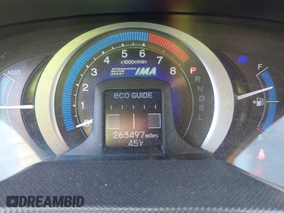 2010 Honda Insight LX with VIN JHMZE2H59AS006887, listed as a IAAI auction lot 41159288 with 263,497 mi miles and . Bid and sale history available at DreamBid. Image 7.