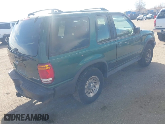 1999 Ford Explorer Sport with VIN 1FMYU22X2XUB19728, listed as a IAAI auction lot 41642358 with 128,788 mi miles and . Bid and sale history available at DreamBid. Image 4.