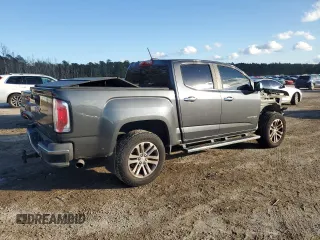 2016 GMC Canyon 2WD SLT with VIN 1GTG5DE37G1271880, listed as a Copart auction lot 79825324 with 141,748 mi miles and Salvage Title. Bid and sale history available at carsss.com. Image 3.