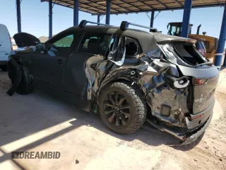 2025 Mazda CX-50 S Premium z VIN 7MMVABDM6SN307397, wystawiony jako Copart lot #57020085 z przebiegiem 13 504 mil mil oraz Szkoda całkowita • Salvage title. Historia ofert i sprzedaży dostępna na DreamBid. Obrazek 2.