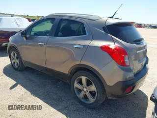 2014 Buick Encore Convenience with VIN KL4CJBSB5EB786291, listed as a IAAI auction lot 41972547 with 108,534 mi miles and . Bid and sale history available at DreamBid. Image 3.