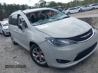 2017 Chrysler Pacifica Limited with VIN 2C4RC1GG9HR560544, listed as a IAAI auction lot 41807810 with 137,768 mi miles and . Bid and sale history available at DreamBid. Image 1.