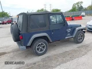 2004 Jeep Wrangler X with VIN 1J4FA39S64P726711, listed as a IAAI auction lot 42227336 with Not Provided miles and . Bid and sale history available at DreamBid. Image 4.