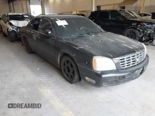 2004 Cadillac DeVille DHS z VIN 1G6KE54Y04U152515, wystawiony jako IAAI lot #41507297 z przebiegiem 166 540 mil mil oraz . Historia ofert i sprzedaży dostępna na DreamBid. Obrazek 1.