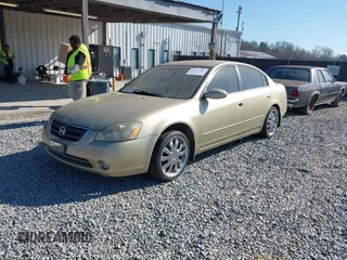 2002 Nissan Altima S with VIN 1N4AL11D92C287784, listed as a IAAI auction lot 41671404 with 131,942 mi miles. Bid and sale history available at carsss.com. Image 2.