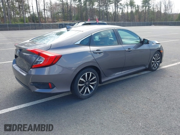 2016 Honda Civic Sedan EX-L with VIN 19XFC1F73GE201419, listed as a IAAI auction lot 42027720 with 168,134 mi miles. Bid and sale history available at carsss.com. Image 4.