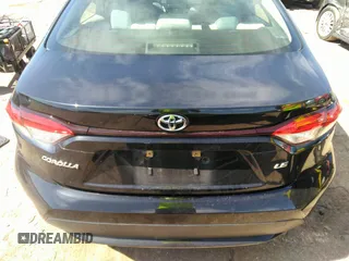 2021 Toyota Corolla LE with VIN JTDEPMAE5MJ126390, listed as a IAAI auction lot 41669331 with 77,398 mi miles. Bid and sale history available at carsss.com. Image 16.