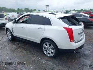 2015 Cadillac SRX Performance Collection with VIN 3GYFNFE35FS613177, listed as a IAAI auction lot 42102352 with Not provided miles and . Bid and sale history available at DreamBid. Image 3.