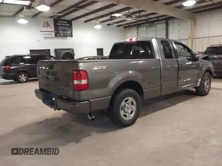 2005 Ford F-150 STX with VIN 1FTRX12W95NB38107, listed as a IAAI auction lot 41185100 with 201,171 mi miles. Bid and sale history available at carsss.com. Image 4.