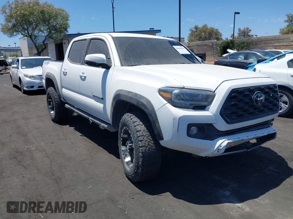 2023 Toyota Tacoma SR with VIN 3TMCZ5AN4PM558760, listed as a IAAI auction lot 42626514 with 39,335 mi miles and . Bid and sale history available at DreamBid. Image 13.