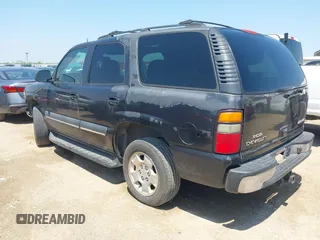 2004 Chevrolet Tahoe LS with VIN 1GNEC13T04R156427, listed as a IAAI auction lot 42333312 with 303,040 mi miles and . Bid and sale history available at DreamBid. Image 3.