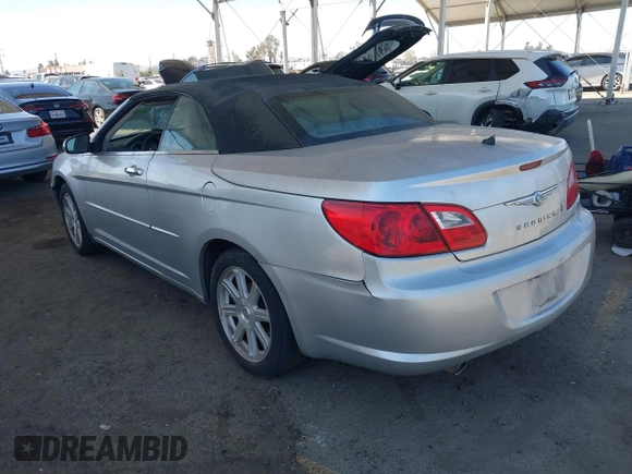 2008 Chrysler Sebring Limited z VIN 1C3LC65M88N268302, wystawiony jako IAAI lot #41882886 z przebiegiem 122 196 mil mil oraz . Historia ofert i sprzedaży dostępna na DreamBid. Obrazek 3.