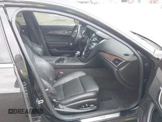 2014 Cadillac CTS Vsport Premium RWD z VIN 1G6AV5S89E0148907, wystawiony jako IAAI lot #41880678 z przebiegiem 148 052 mil mil oraz . Historia ofert i sprzedaży dostępna na DreamBid. Obrazek 5.