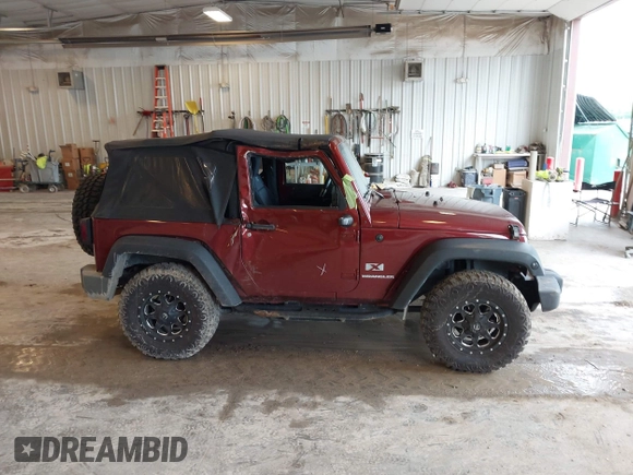 2009 Jeep Wrangler X with VIN 1J4FA24169L756377, listed as a IAAI auction lot 42718401 with 161,565 mi miles and . Bid and sale history available at DreamBid. Image 13.
