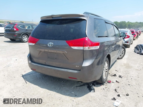 2012 Toyota Sienna XLE AAS with VIN 5TDYK3DCXCS202574, listed as a IAAI auction lot 42714762 with 234,287 mi miles and . Bid and sale history available at DreamBid. Image 4.
