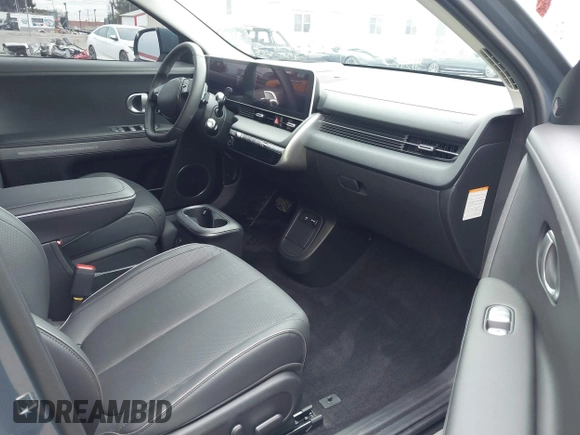 2024 Hyundai Ioniq 5 Limited z VIN KM8KR4DE4RU310424, wystawiony jako IAAI lot #41761478 z przebiegiem 4 027 mil mil oraz . Historia ofert i sprzedaży dostępna na DreamBid. Obrazek 5.