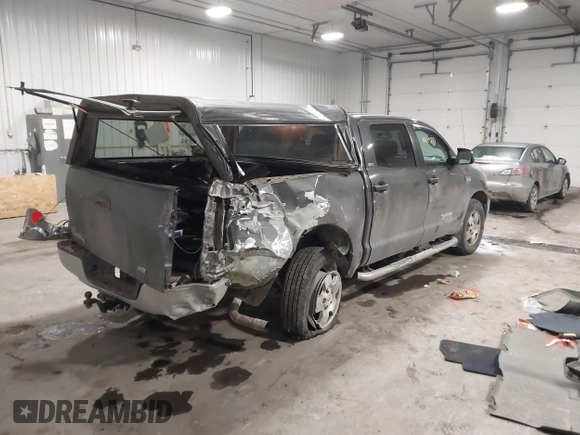 2013 Toyota Tundra 4WD Truck with VIN 5TFDW5F16DX305917, listed as a IAAI auction lot 41640555 with 255,812 mi miles. Bid and sale history available at carsss.com. Image 4.