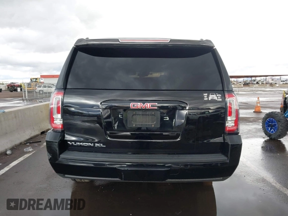 2019 GMC Yukon XL SLT with VIN 1GKS1GKC7KR155668, listed as a IAAI auction lot 41751792 with 163,537 mi miles. Bid and sale history available at carsss.com. Image 17.