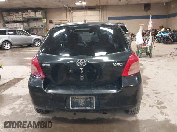2008 Toyota Yaris with VIN JTDJT923285196299, listed as a IAAI auction lot 42152850 with 214,238 mi miles. Bid and sale history available at carsss.com. Image 16.