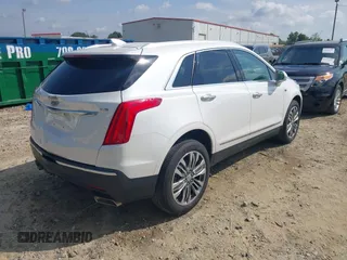 2018 Cadillac XT5 Premium Luxury FWD with VIN 1GYKNERS4JZ128051, listed as a IAAI auction lot 42296609 with 86,661 mi miles and . Bid and sale history available at DreamBid. Image 4.