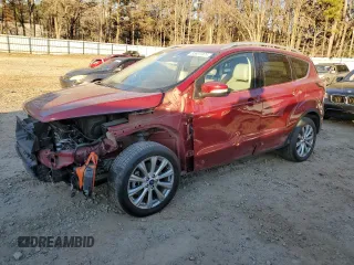 2017 Ford Escape Titanium with VIN 1FMCU0J94HUD34112, listed as a Copart auction lot 85837974 with 127,576 mi miles and Salvage Title. Bid and sale history available at carsss.com. Image 1.