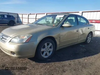 2002 Nissan Altima S with VIN 1N4AL11D52C125375, listed as a IAAI auction lot 41378101 with 148,701 mi miles. Bid and sale history available at carsss.com. Image 2.