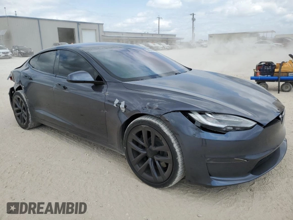 2021 Tesla Model S Long Range with VIN 5YJSA1E51MF453924, listed as a Copart auction lot 53486495 with 48,599 mi miles and Salvage title. Bid and sale history available at DreamBid. Image 4.