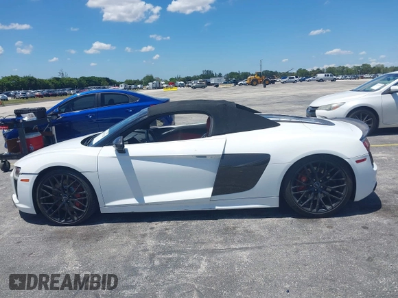 2017 Audi R8 z VIN WUAVACFX0H7903232, wystawiony jako IAAI lot #42247728 z przebiegiem 74 755 mil mil oraz . Historia ofert i sprzedaży dostępna na DreamBid. Obrazek 14.