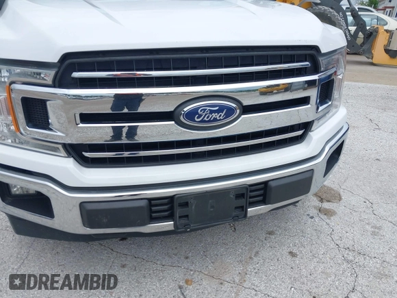 2019 Ford F-150 XL z VIN 1FTMF1C51KKC79270, wystawiony jako IAAI lot #42337543 z przebiegiem 146 916 mil mil oraz . Historia ofert i sprzedaży dostępna na DreamBid. Obrazek 6.