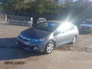2012 Honda Insight EX z VIN JHMZE2H70CS004787, wystawiony jako IAAI lot #40668475 z przebiegiem 127 599 mil mil oraz . Historia ofert i sprzedaży dostępna na DreamBid. Obrazek 2.