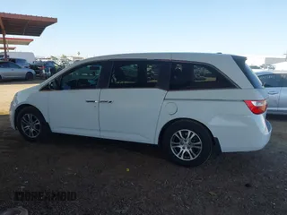 2012 Honda Odyssey EX-L with VIN 5FNRL5H67CB051764, listed as a IAAI auction lot 42493181 with 167,189 mi miles and . Bid and sale history available at DreamBid. Image 14.