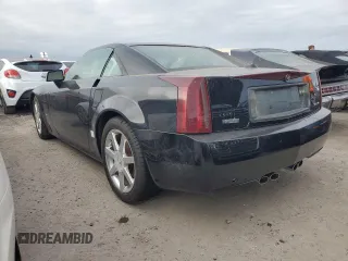 2005 Cadillac XLR z VIN 1G6YV34A955600425, wystawiony jako Copart lot #76188034 z przebiegiem Nie podano mil oraz Szkody całkowita. Historia ofert i sprzedaży dostępna na DreamBid. Obrazek 2.
