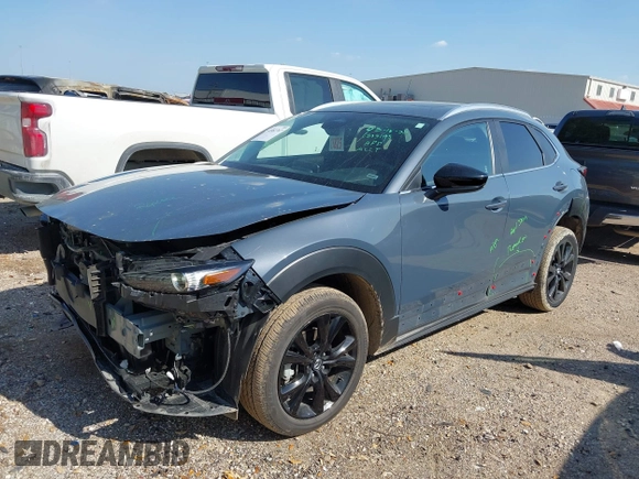 2024 Mazda CX-30 S Carbon Edition z VIN 3MVDMBCM6RM682780, wystawiony jako IAAI lot #41882767 z przebiegiem 19 047 mil mil oraz . Historia ofert i sprzedaży dostępna na DreamBid. Obrazek 18.