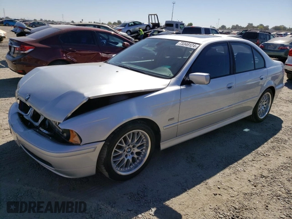 2002 BMW 5 Series 530iA with VIN WBADT63452CH97129, listed as a Copart auction lot 73349124 with 64,431 mi miles and Salvage Title. Bid and sale history available at carsss.com. Image 1.